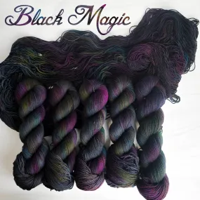 Black Magic- Hand dyed variegated yarn -black rainbow