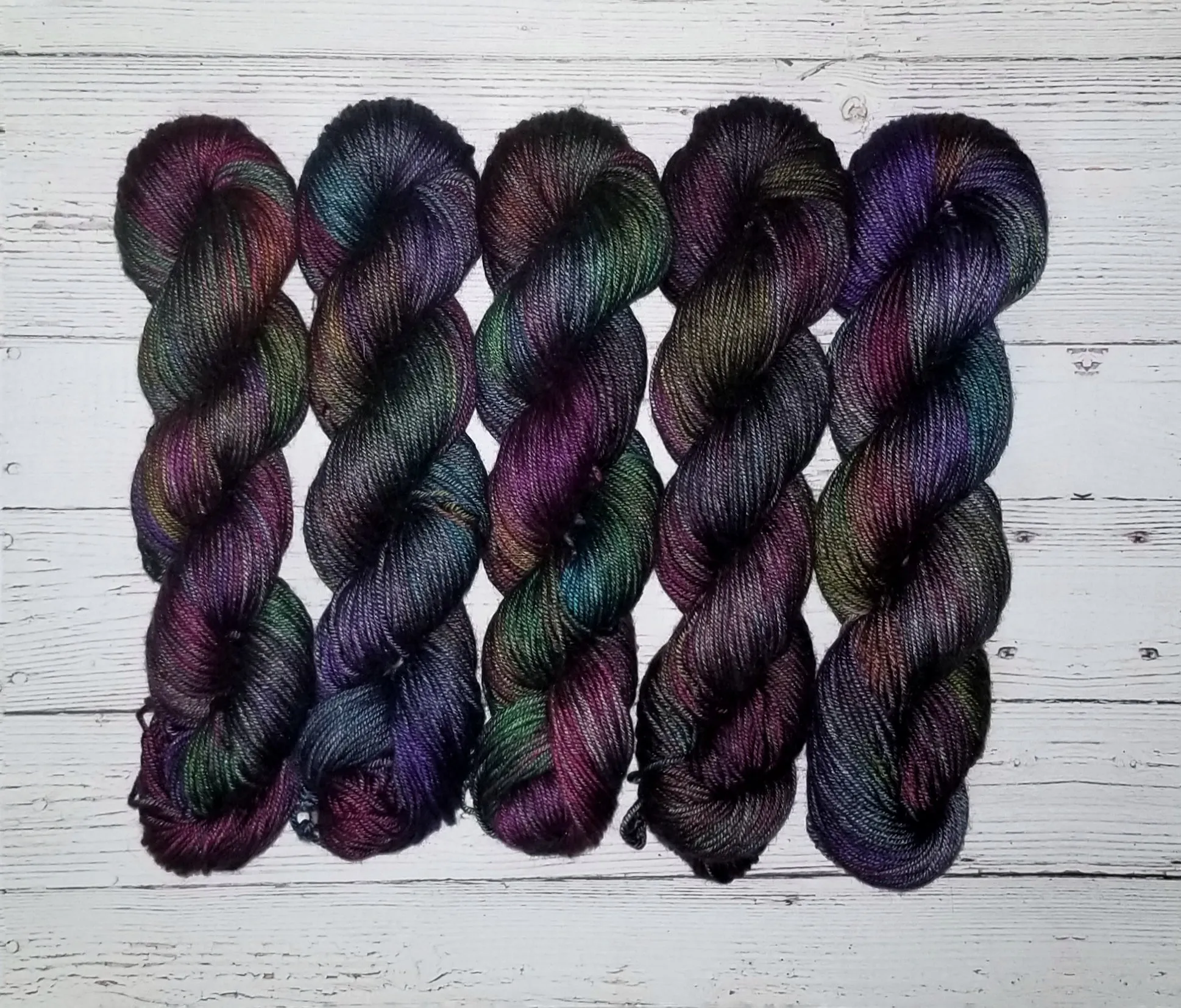 Black Magic- Hand dyed variegated yarn -black rainbow