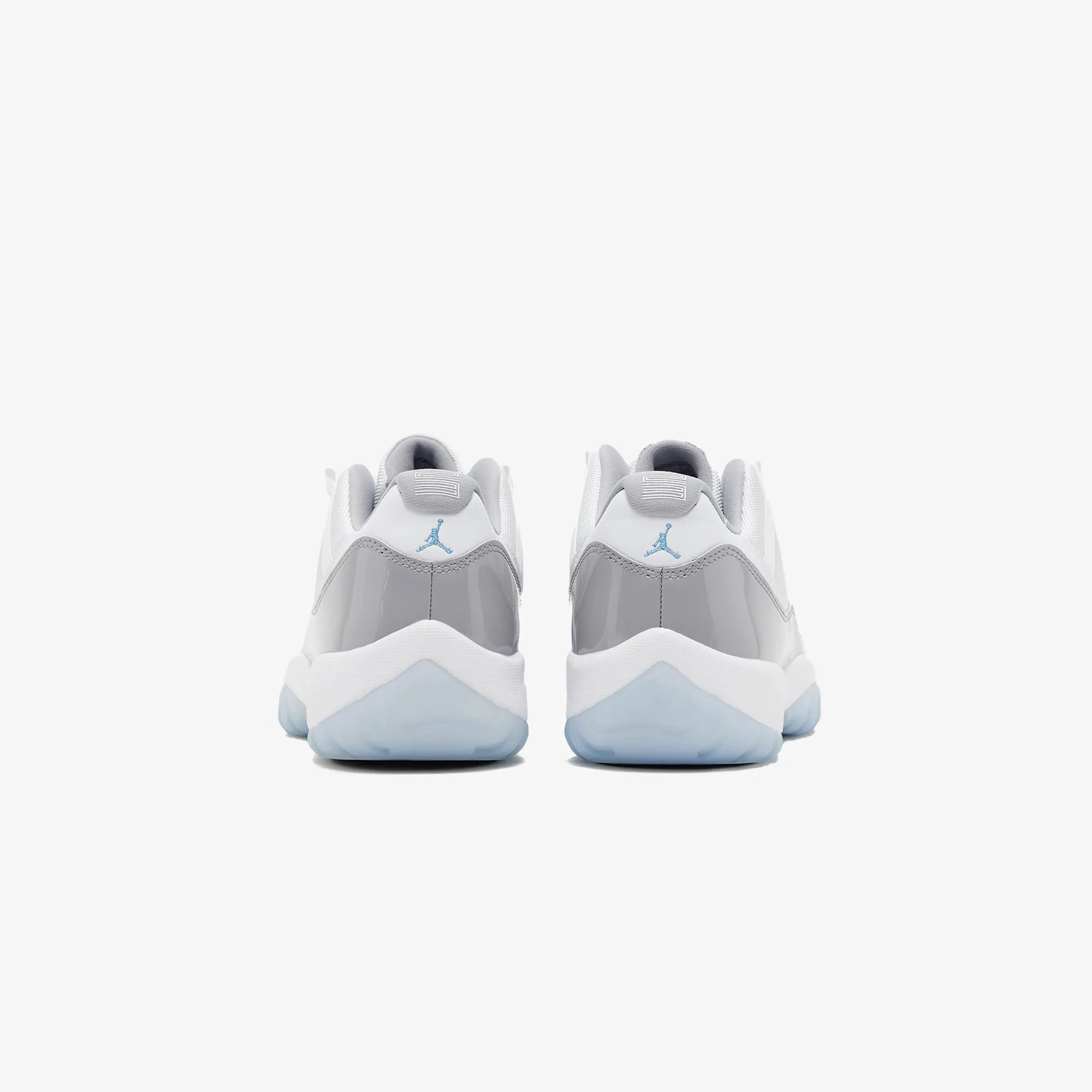 Jordan | AIR JORDAN 11 RETRO LOW  { WHITE/UNIVERSITY BLUE-CEMENT GREY