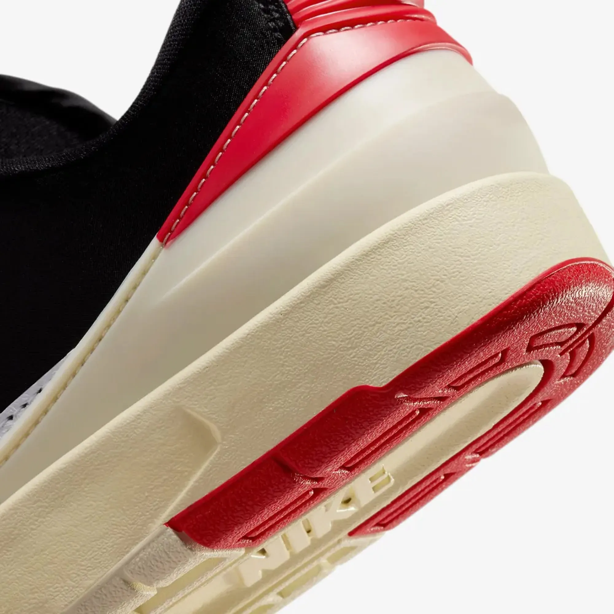 Jordan | WMN'S AIR JORDAN 2 RETRO LOW  { WHITE/UNIVERSITY RED-BLACK-COCONUT MILK